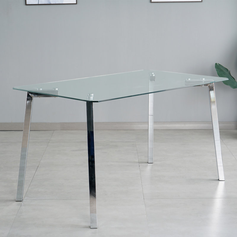 Table de salle à manger moderne et minimaliste en verre