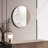 "Lunar Serenity" 20" Round Wall Mirror with a 3D Textured Crescent Moon Embellishment