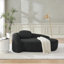 Fauteuil paresseux moderne simple ovale avec dossier intégré, accoudoirs latéraux et coussin, chaise longue compacte peu encombrante pour le salon - noir