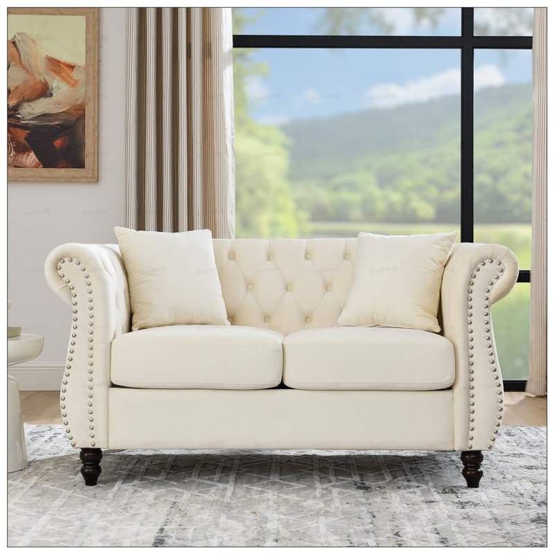 Canapé classique à 2 places Chesterfield avec accoudoirs roulés et garniture cloutée, idéal pour les espaces variés