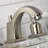Kingston Brass Paris Two-Handle 3-Hole Deck Mount Widespread Bathroom Faucet with Brass Pop-Up Drain-54357543