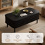 Table basse en bois cannelé de 110 cm avec porte coulissante et rangement-405564702