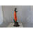 Young Lady In Orange Bronze Statue - Size: 7"L X 26"W X 25"H.