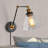 Annariitta 1-Light Industrial Wall Lamp with Antique Brass Finish for Bedroom Reading