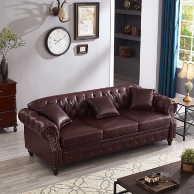 Salon Canapé Chesterfield classique capitonné en similicuir avec rangement