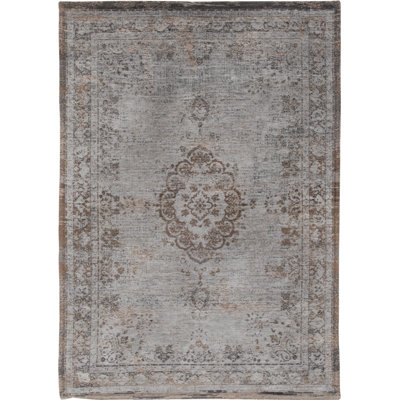Fading World Oriental Area Rug