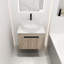 Meuble-lavabo de 24 po avec lavabo en céramique. Fixation murale en chêne blanc. Porte à fermeture en douceur pour un rangement moderne et paisible en chêne. Avec lavabo et robinet