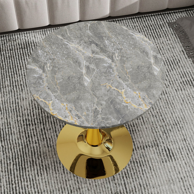Cette table basse de 27,6 pouces de style Mid-Century de style moderne Mid-Century peut accueillir de 2 à 4 personnes et comprend un plateau de table rond en marbre texturé gris foncé, convenant à divers espaces.
