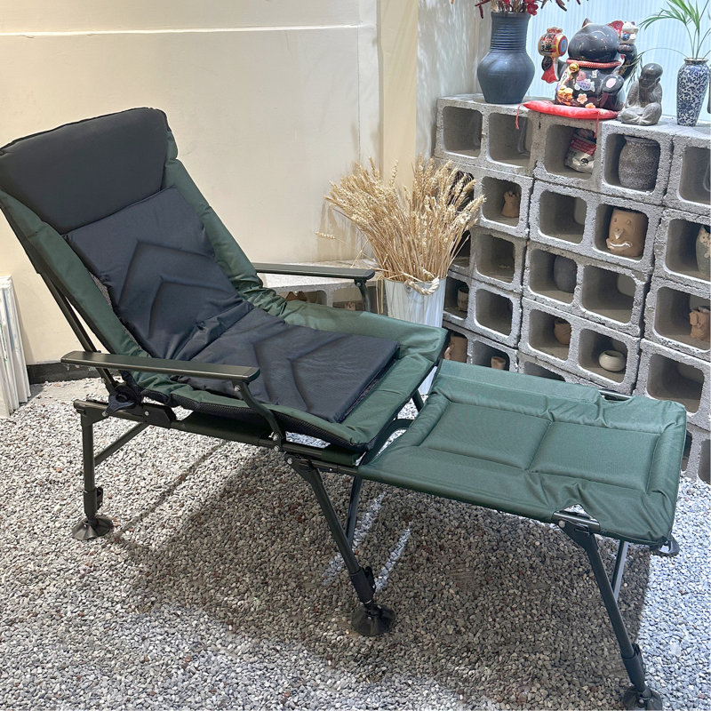 + Fauteuil de camping noir avec repose-pieds réglable et coussin central pour une éponge de détente en extérieur