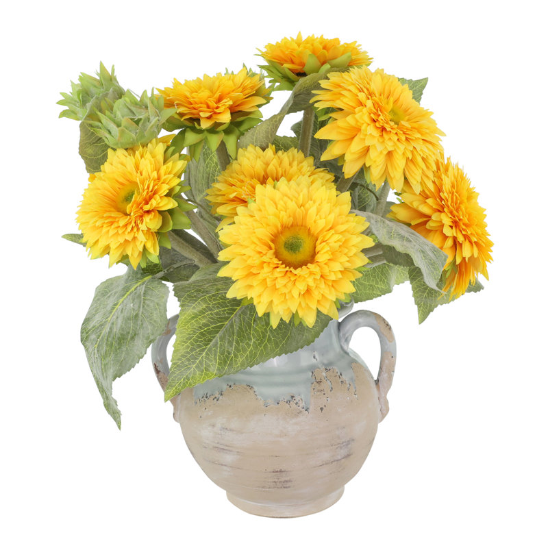 Tournesols disposés dans un vase en pierre