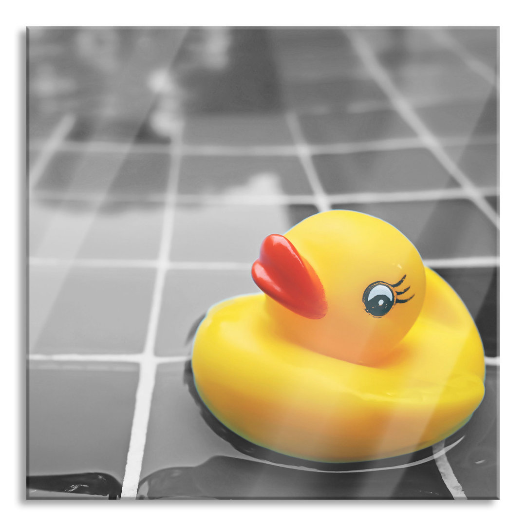 Glasbild Gummi-Ente im Wasser