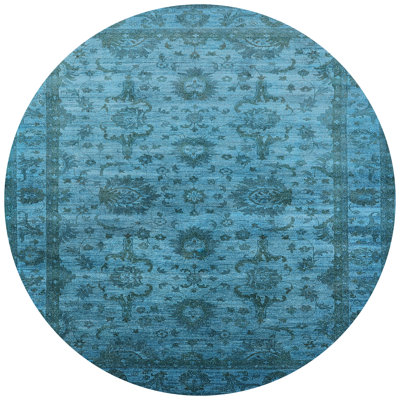 Tapis bleu sarcelle à motif oriental