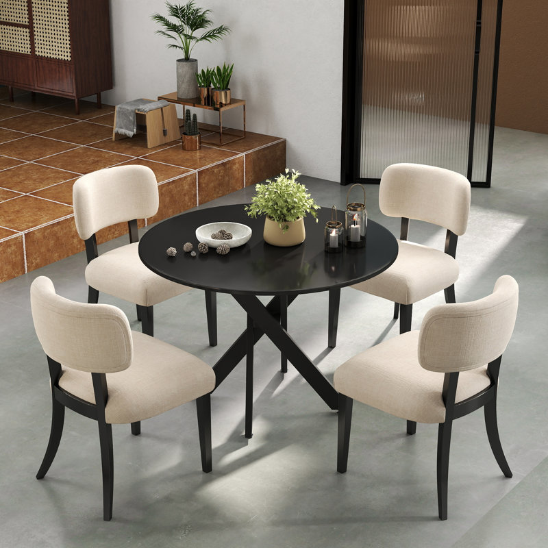 Ensemble de salle à manger à piédestal rond avec chaises rembourrées, Ensemble de cinq pièces : table, quatre chaises, Noir