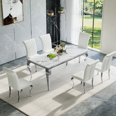 Ensemble repas avec plateau en faux marbre et chaises rembourrées
