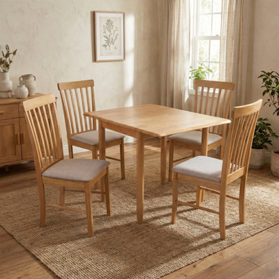 Ankrum 4 - Person Drop Leaf Rubberwood Solid Wood Dining Set