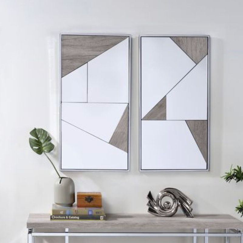 Ensemble de deux miroirs d'appoint encadrés en métal naturel