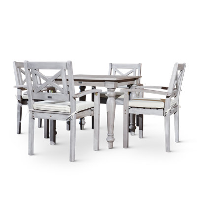Ensemble repas d'extérieur carré 5 pièces avec structure et coussins en bois massif Kiersten