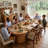 Extendable 35.43'' - 82.68''  Oval Dining Table with Hidden Storage, on Casters， for 2–10 People