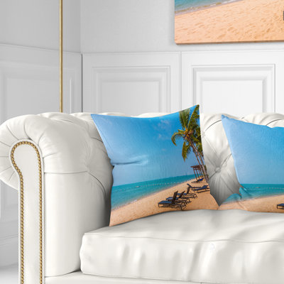 Coussin imprimé plage bleue avec palmiers