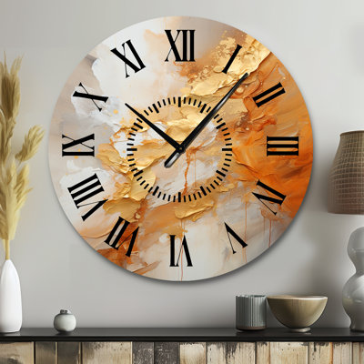 Horloge murale à spirales abstraites et or
