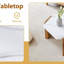 Table basse hexagonale de 31 pouces de style moderne avec surface en marbre blanc.