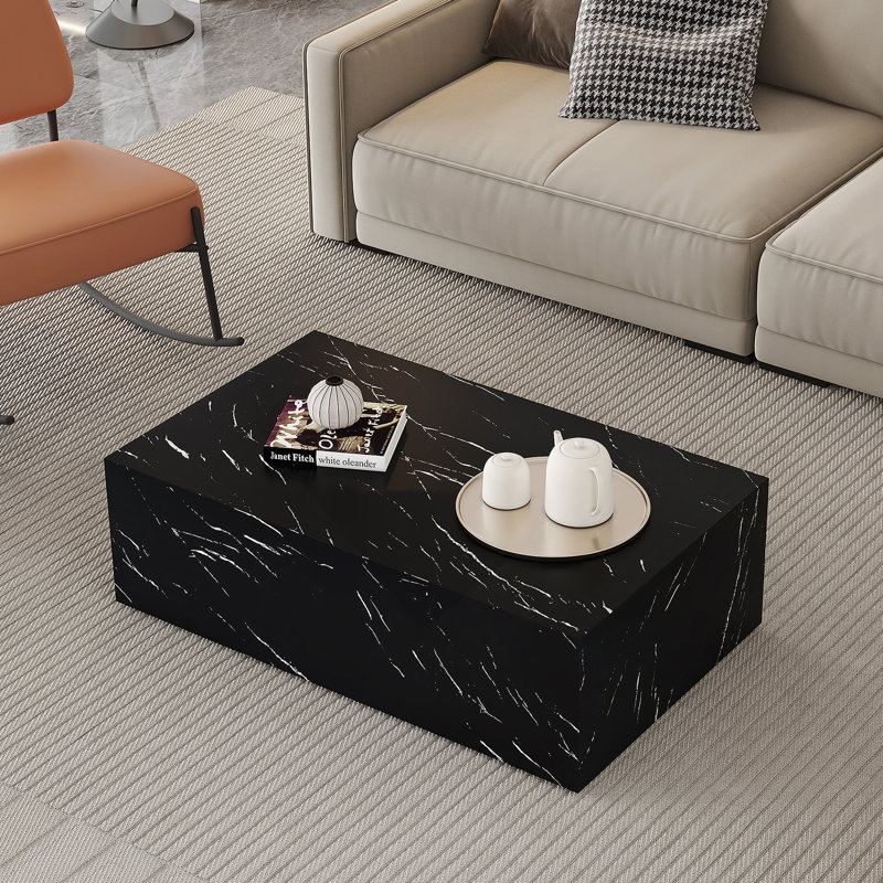 Table basse en marbre noir texturé