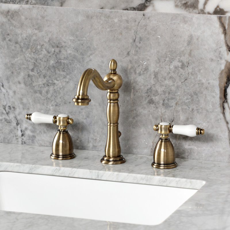 Kingston Brass Bel-Air Two-Handle 3-Hole Deck Mount Widespread Bathroom Faucet with Pop-Up Drain, Antique Brass