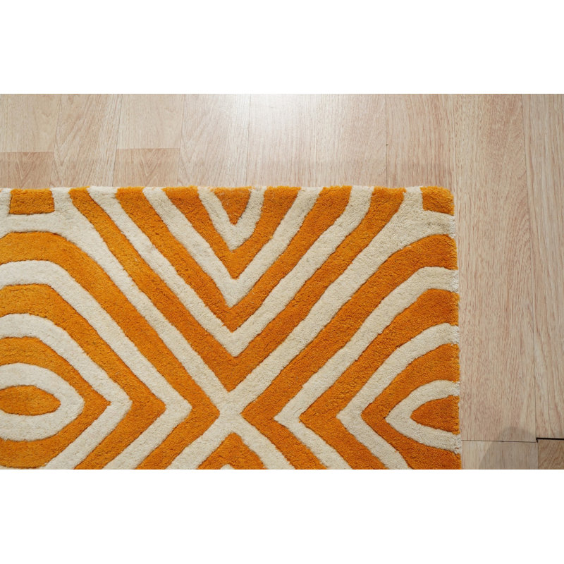Tapis orange clair en laine touffeté à la main