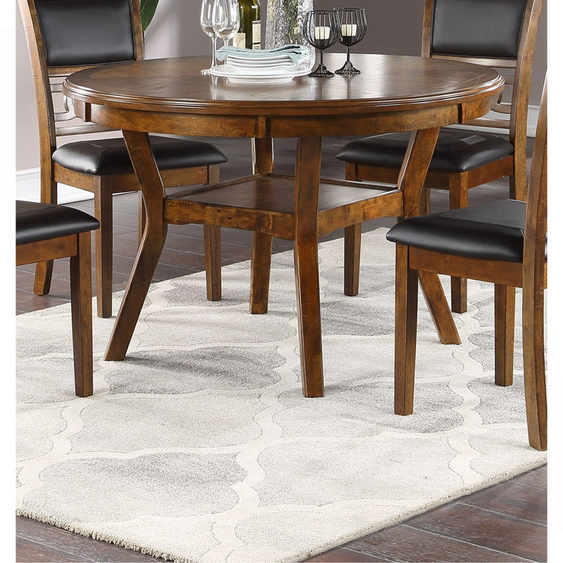 Table ronde en noyer de style contemporain avec plateau de rangement inférieur et pieds uniques