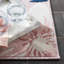 Tapis intérieur / extérieur à motif floral rose / gris Abdalah-2004133306