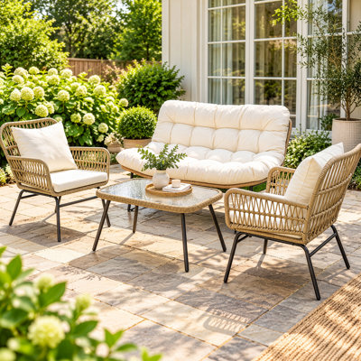 Ensemble de conversation bohème pour patio extérieur en résine tressée 4 personnes avec coussins, canapé 2 places de 130 cm, 2 fauteuils et table basse en verre