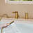 Single Handle Deck Mounted Roman Tub Faucet with Hand Shower & Swivel Spout-122811696