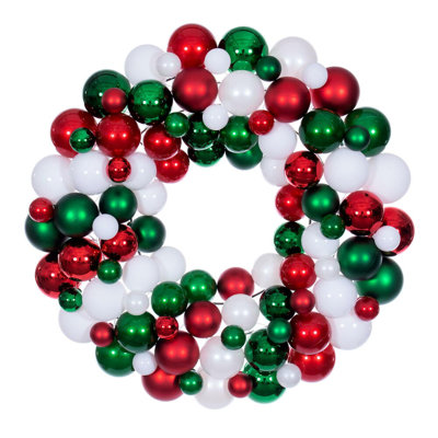  24" White/Red/Green Ball Wreath. It features 93 ornaments in a mixture of 1.5", 2.4", 2.8", and 3.1" sizes. It features a combination of red, white and green ornaments in matte, shiny, and candy finishes.