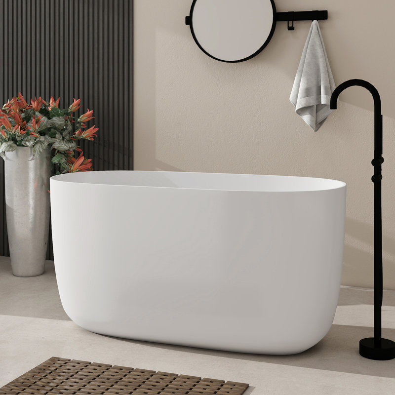 Baignoire de trempage en résine à surface solide de 47 po avec trop-plein et drain escamotable