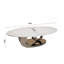 Table basse en marbre avec base sculpturale en acier inoxydable