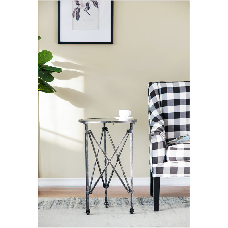 D17x26,5 Table d'appoint Gilbert avec finition noire patinée et plateau en verre, parfaite pour un décor moderne et polyvalent.