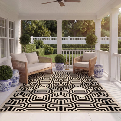 Tapis intérieur / extérieur sable / noir Arneshia