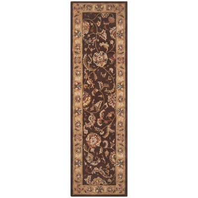 Gilta Rectangle Oriental Handmade Wool Area Rug in Black/Brown