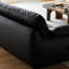 Causeuse-coussin modulable noire en cuir véritable