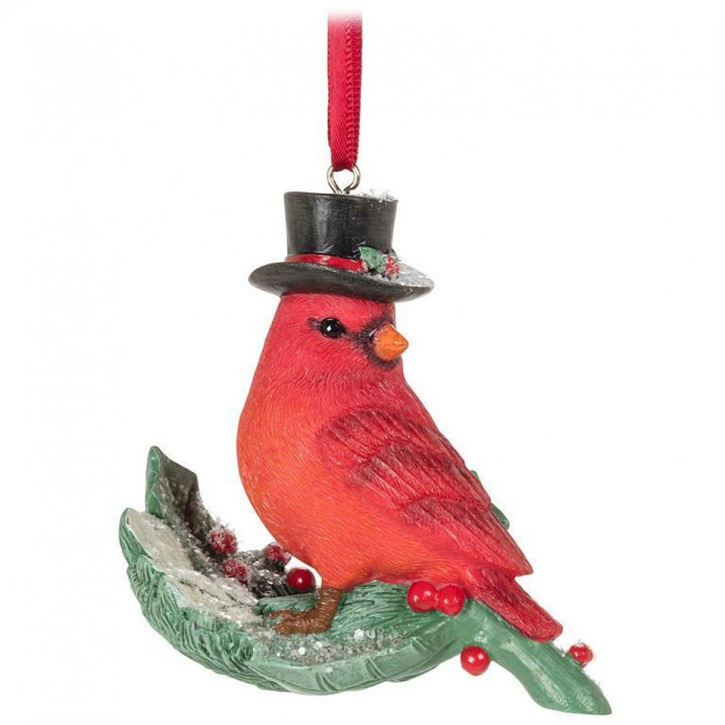 Ornement cardinal sur feuille de houx