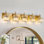 Luminaire de meuble-lavabo moderne en cristal doré - applique murale à 5 lumières à intensité variable avec cristaux K9 pour miroir ou chambre à coucher