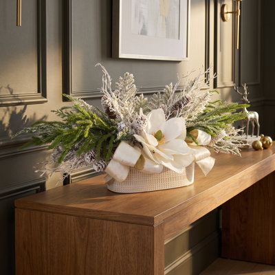 Arrangement de vacances Magnolia avec pommes de pin et boucles