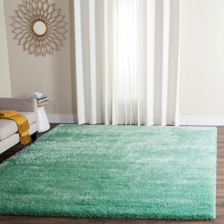 Delane Teal Area Rug
