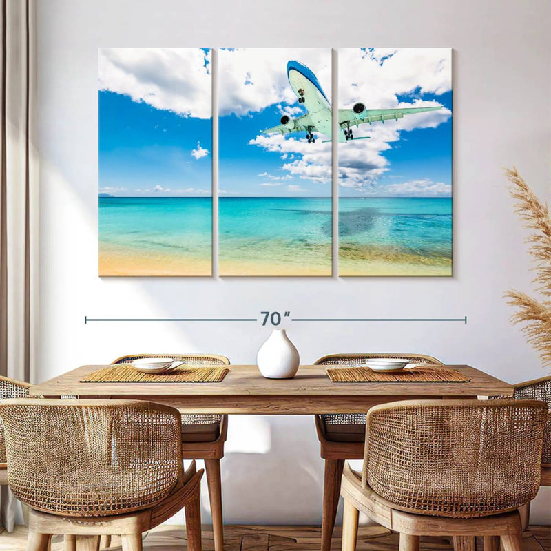 Avion au-dessus de la plage, H 42 po x l 65 po