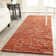 Ferrera Striped Handmade Flatweave Rust Area Rug