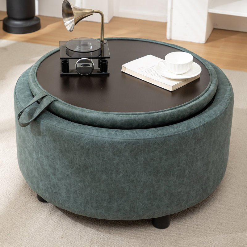Savinien Upholstered Round Storage Ottoman, Blue Performance Faux Leather
