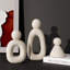 Ensemble de 3 figurines abstraites de famille