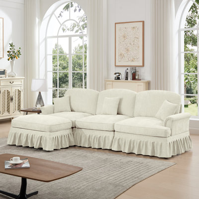Canapé modulaire en forme de L Mid-Century à trois places avec accoudoirs évasés et volants amovibles, avec jupes plissées et pieds fuselés, canapé à 3 places en chenille confortable avec repose-pieds mobile