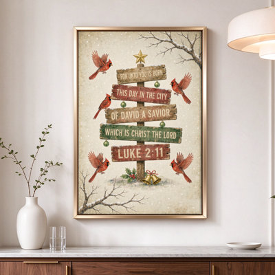 Tableau encadré sur toile, représentant un verset biblique de Noël tiré du chapitre 2 de l'Évangile selon Luc (11), avec des cardinaux. Cadre beige, 61 x 91 cm.