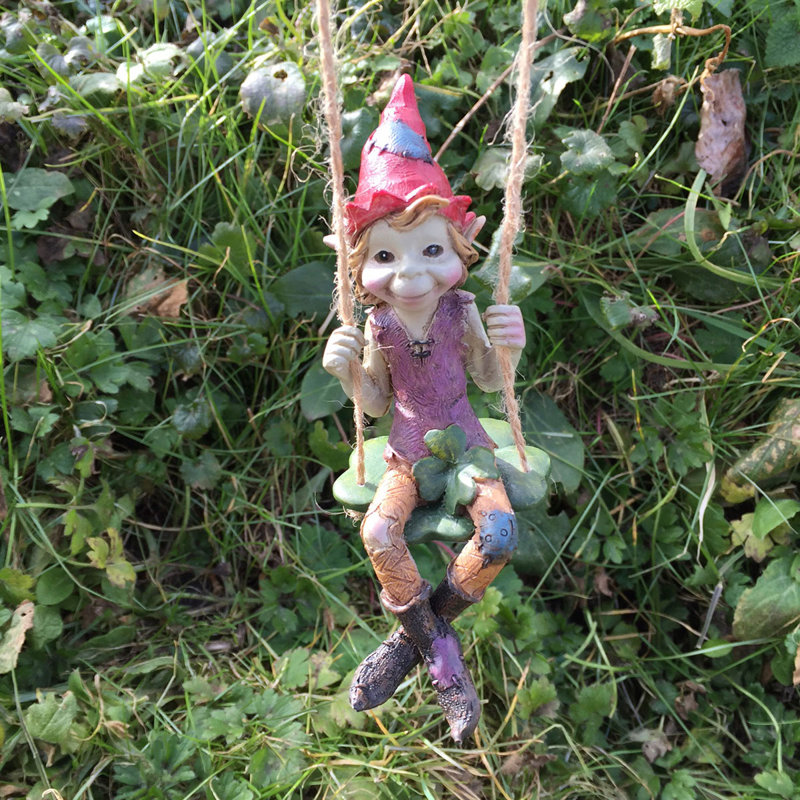 Eudora Pixie Hanging On A Clover Swing